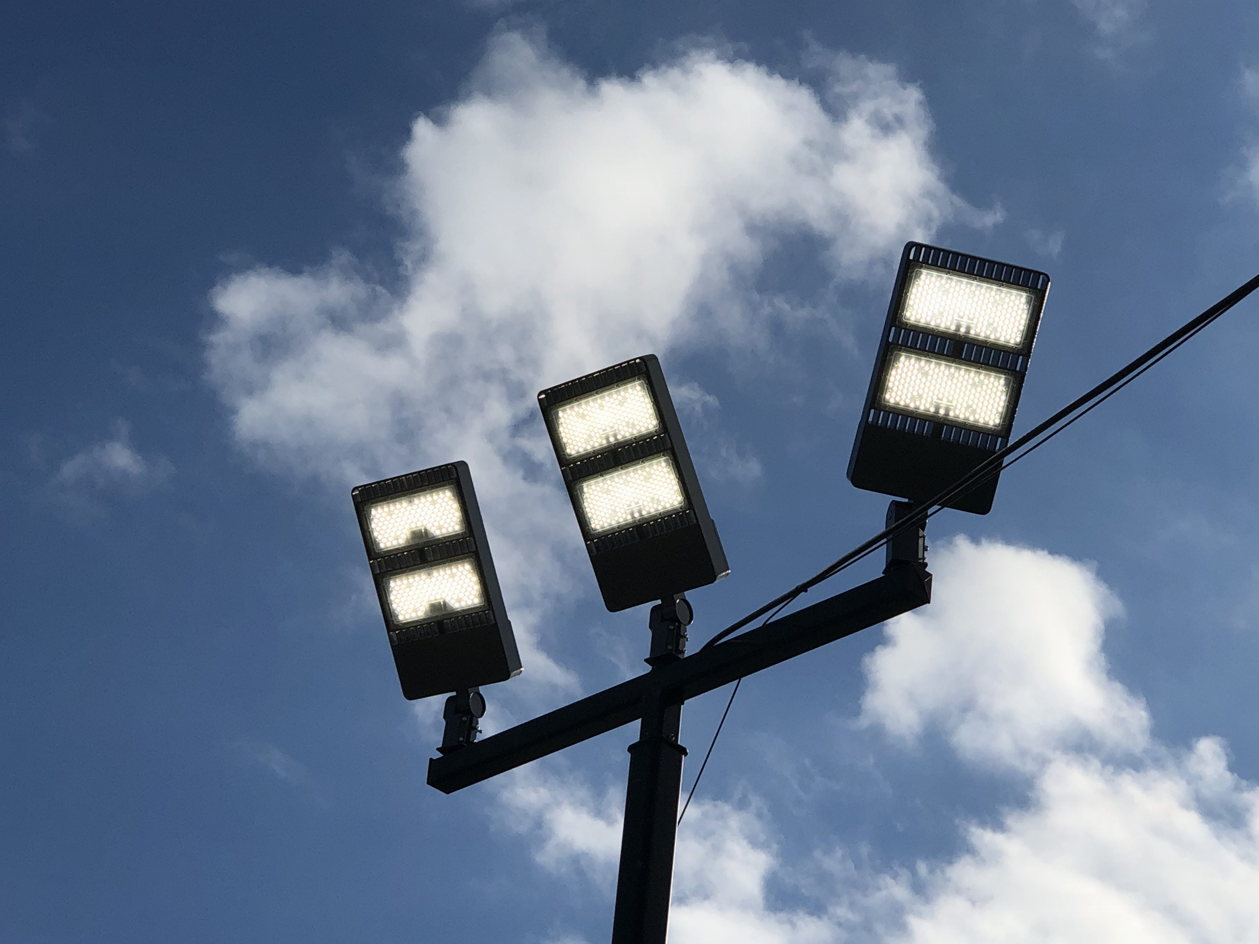 Parking lot Lighting Metal Halide TO LED NYC Neon Sign Installation